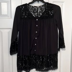 Black sheer blouse with lace.